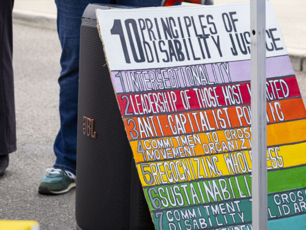 NDIS provider calls for assistance for disability workers during fuel crisis episode artwork
